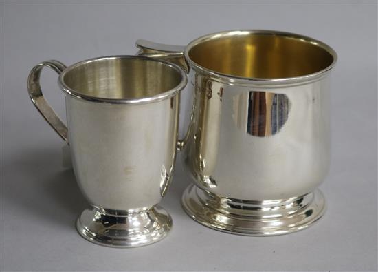 A George V silver christening mug, Chester, 1924 and a smaller modern silver christening mug, 6 oz.